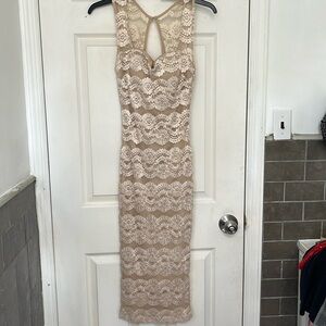Women’s size small nude/ tan color lace pencil skirt sleeveless dress with slip.